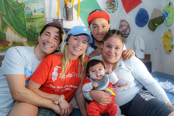 Global Ambassadors Justin Long and Kate Bosworth with Smile Train patient and family