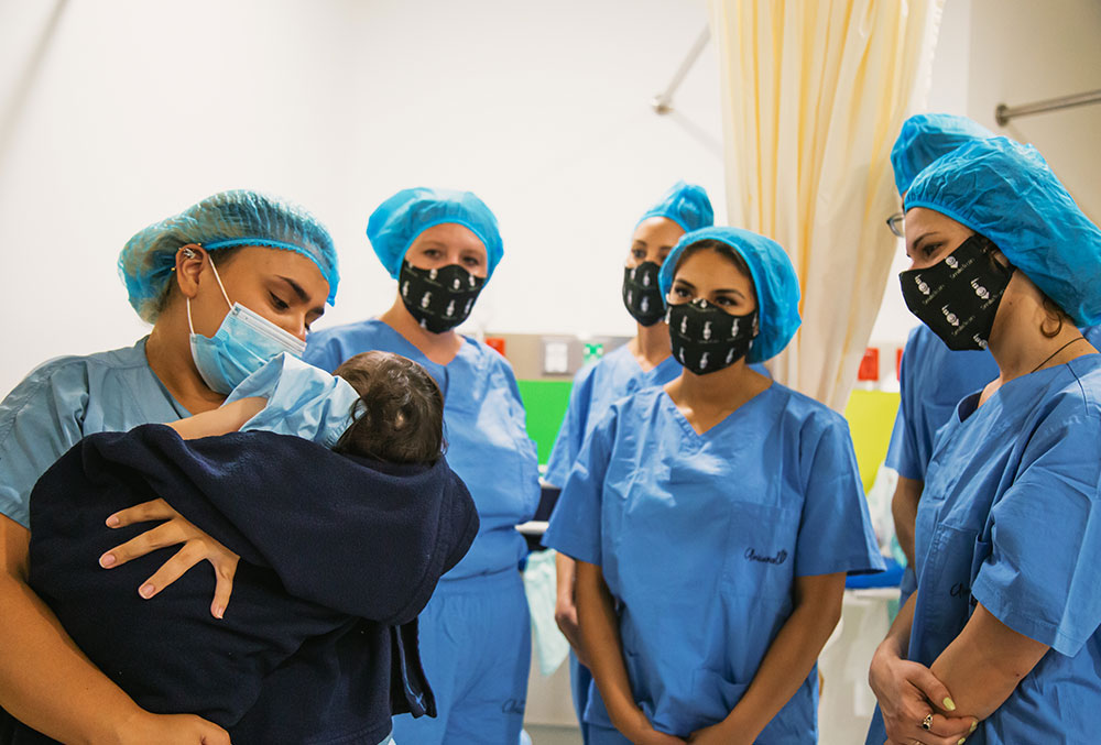 The YLC Journeyers with Celeste immediately after her cleft surgery