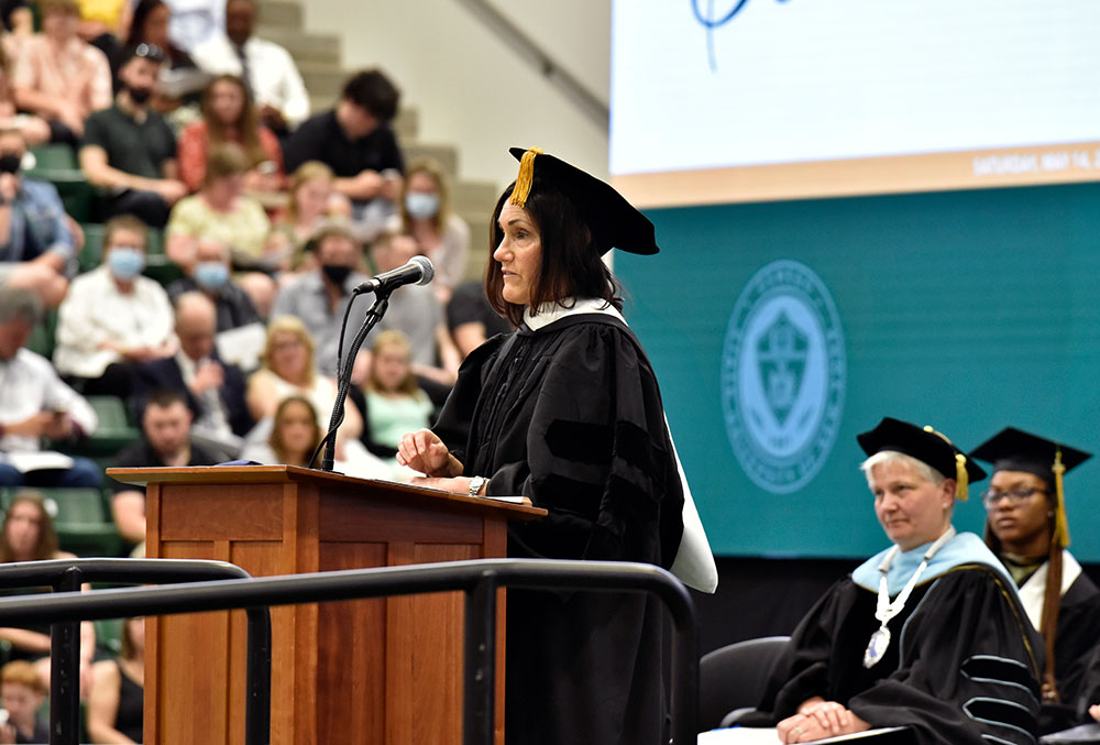 Susannah Schaefer addressing students at SUNY Oswego upon being presented her honorary doctorate