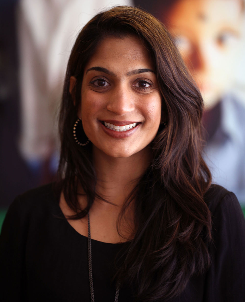 Professional headshot of Priya Desai