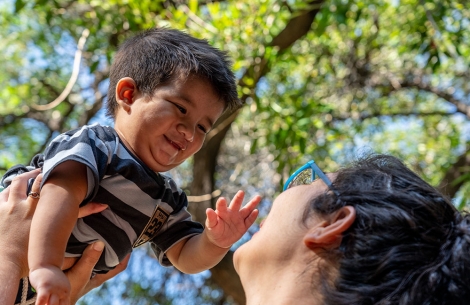 Felix's mother holds him after his free Smile Train-sponsored cleft surgery in Argentina