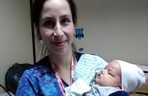 nurse lisette with a baby
