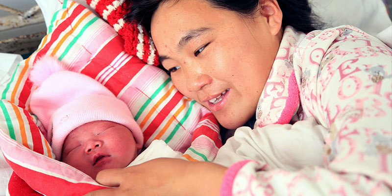 Wang Li - With her infant Son