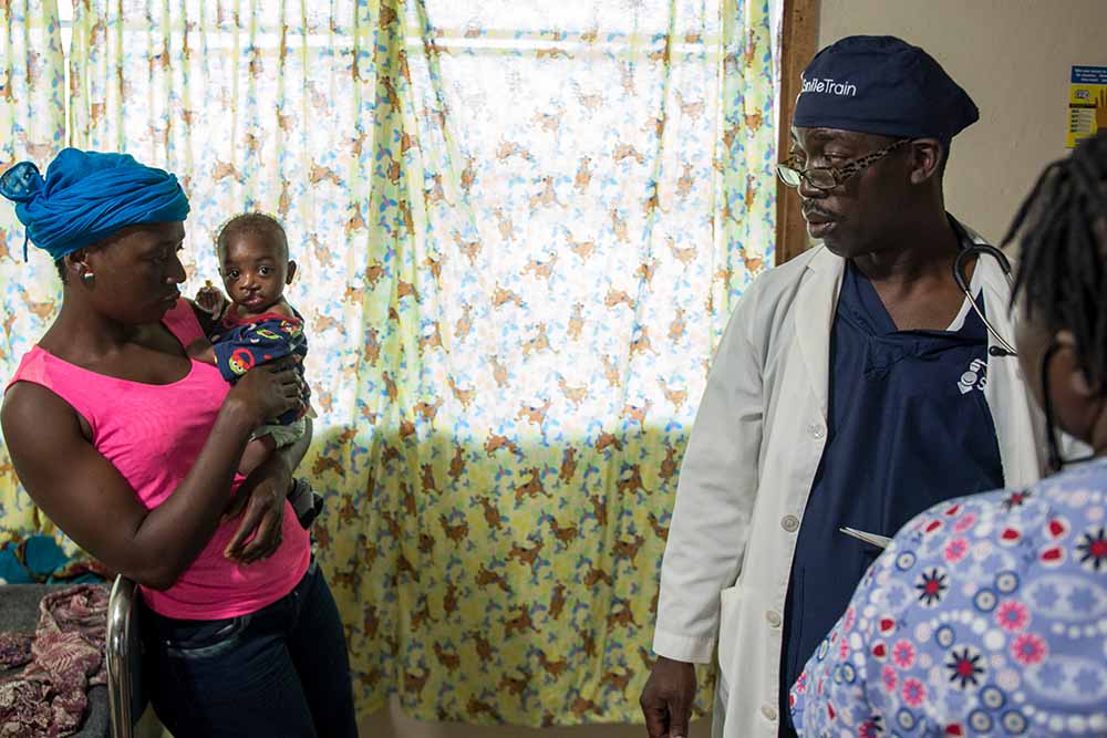 Dr Brown attending to patients at his hospital