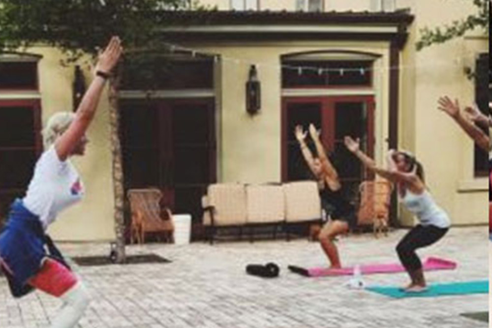 Eva Ehlinger's mother teaching yoga