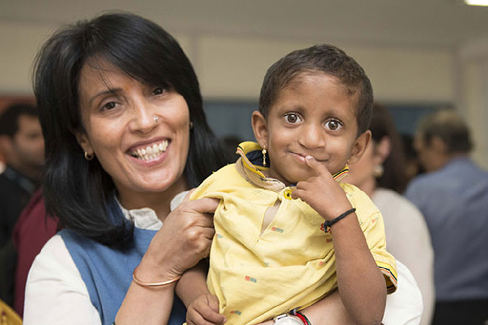 Mamta Carrol with a Smile Train patient