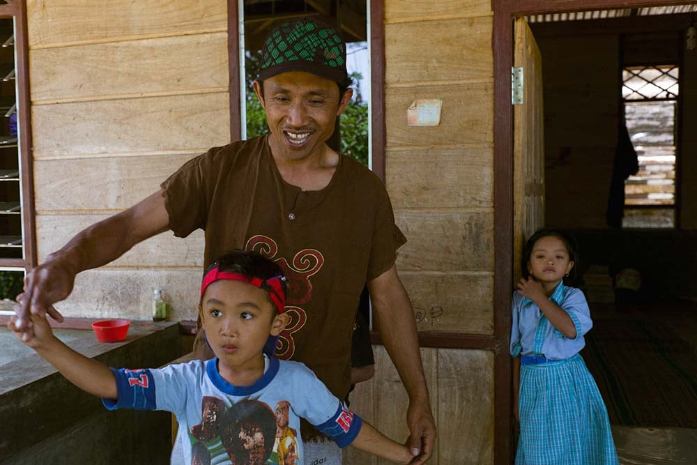 Natsir playing with his kids