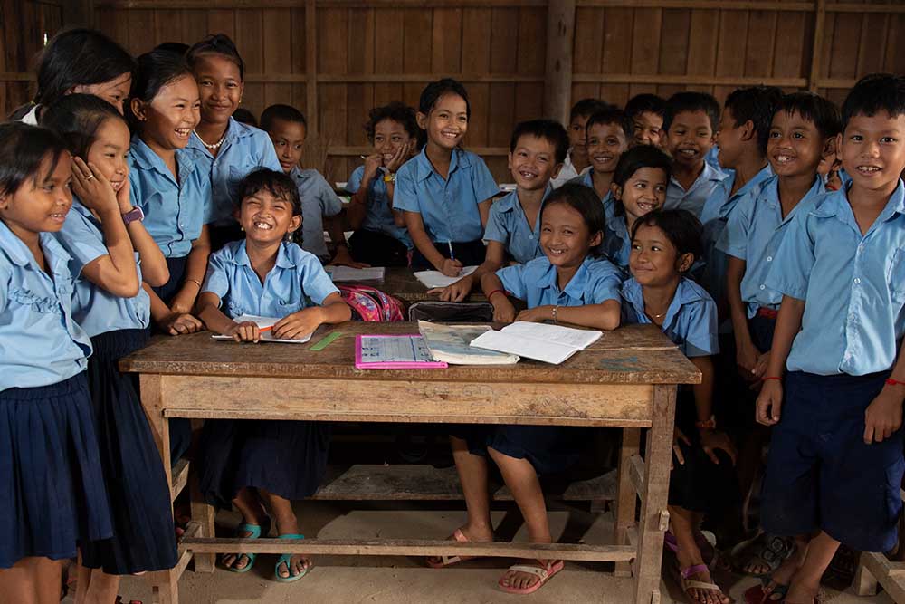 Samnang laughs with her classmates