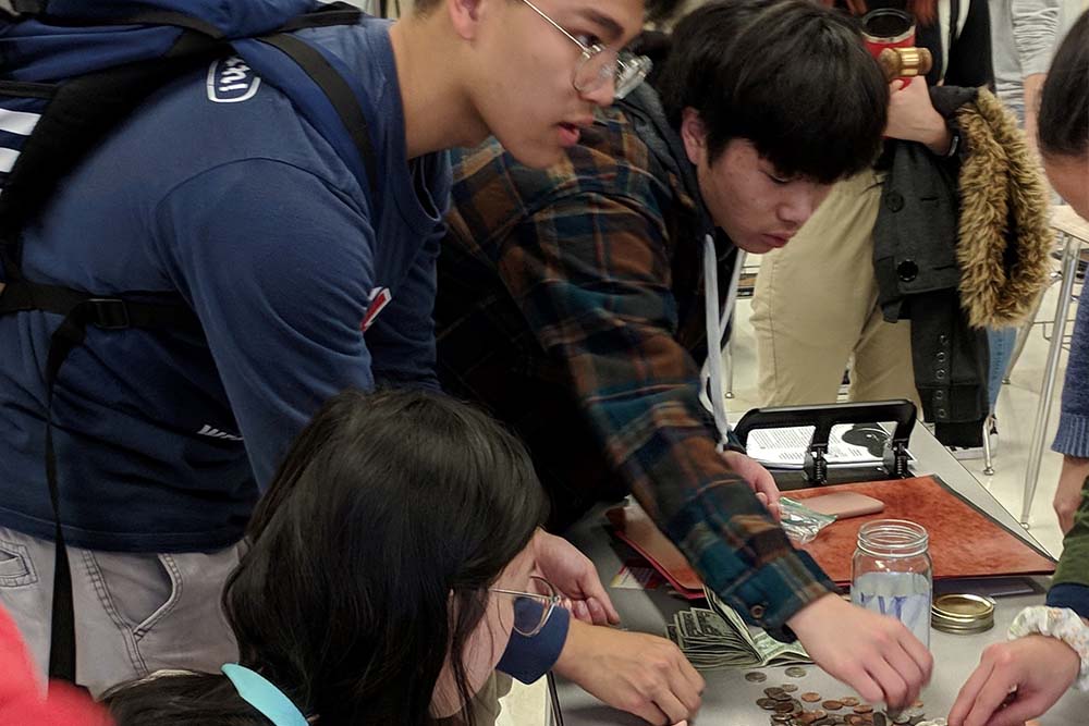 Students gather change 