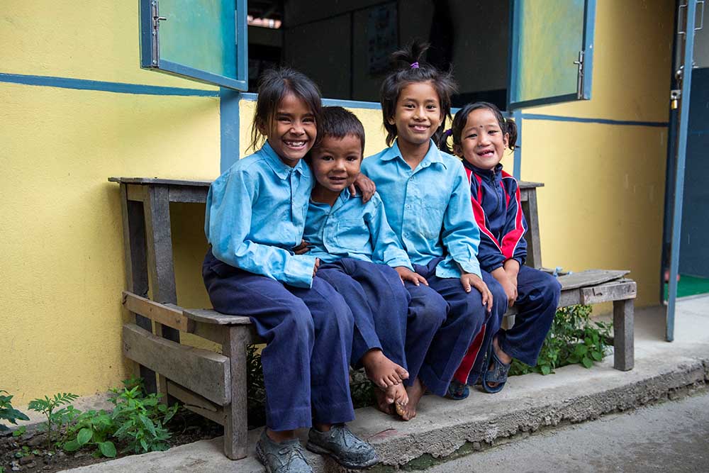 Sushila with her friends at school