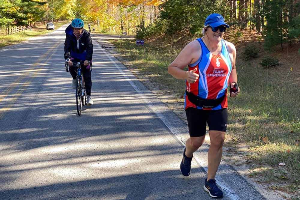 Stef running in Smile Train Team EMPOWER gear