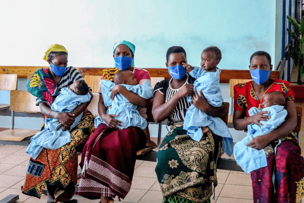 Mothers with their children awaiting free cleft surgery