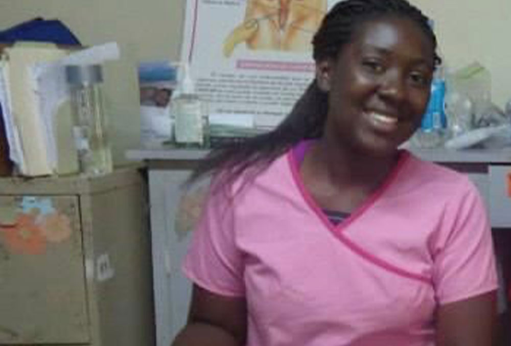 Christian Henry working at a pharmacy clinic in Honduras