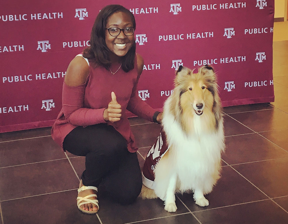 Christian Henry with Reveille, Texas A&M's mascot