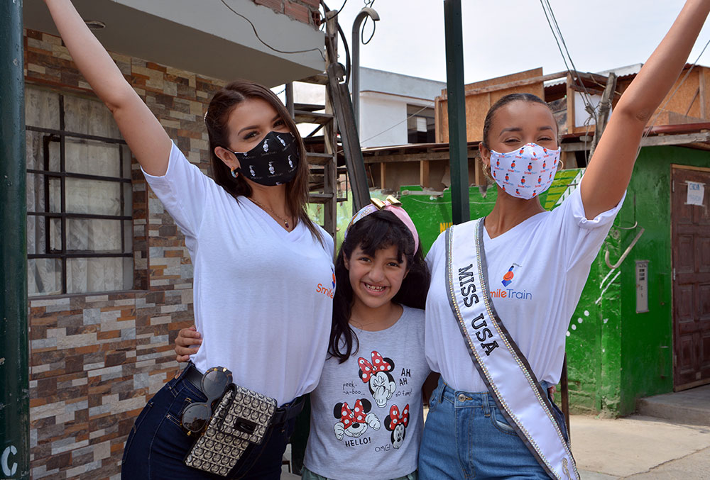 Miss Peru, Estephany, and Miss USA celebrate their new friendship