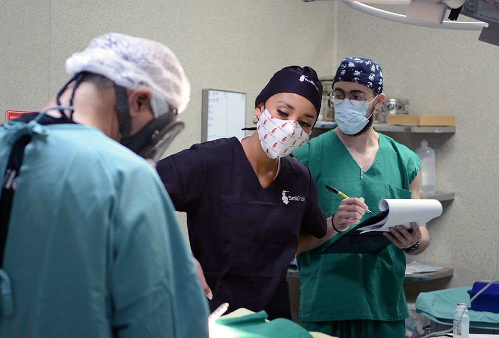 Miss USA watching a Smile Train-sponsored cleft surgery