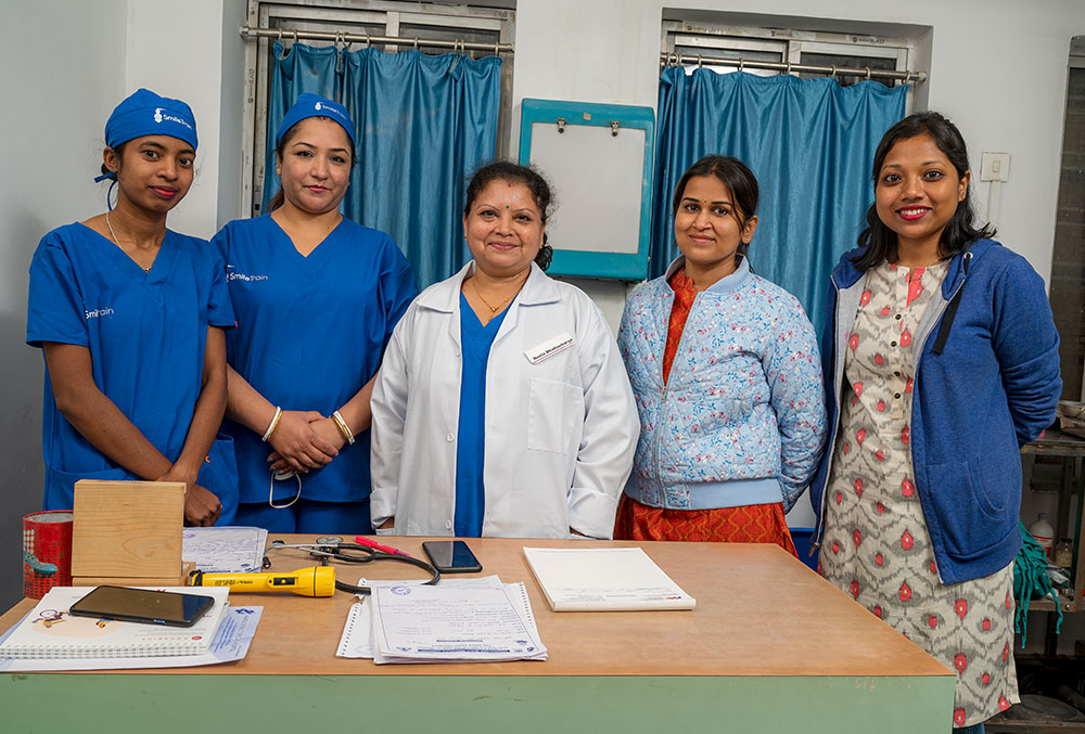 Dr. Neela with some of the women on her staff