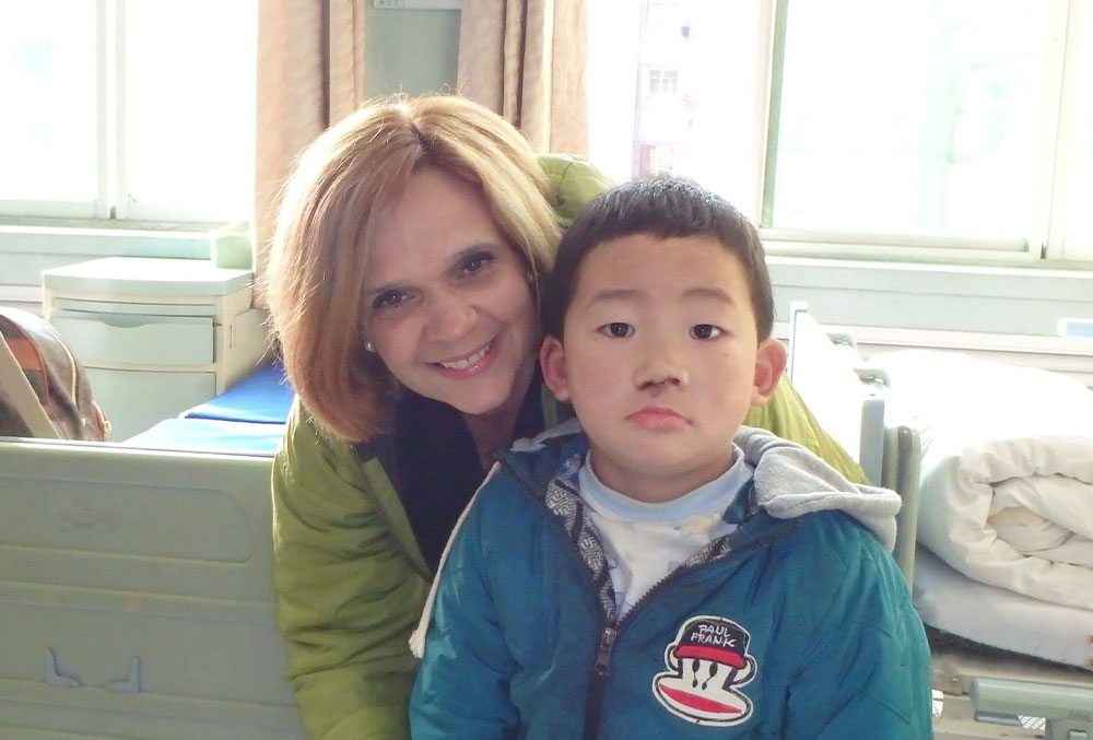 Beatriz with a patient in China