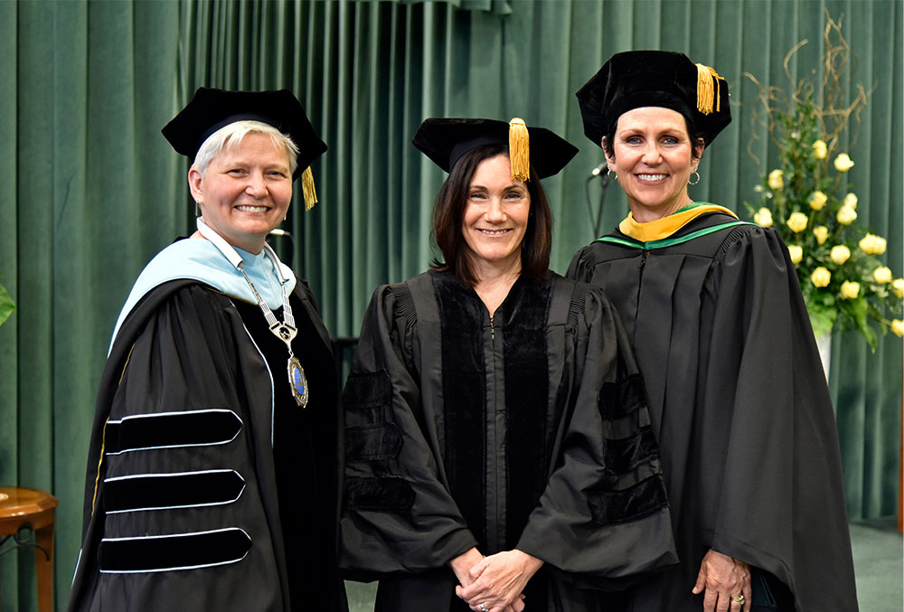 SUNY Oswego Officer in Charge Dr. Mary Toale, Susie, and  Vice President for Development and Alumni Engagement Mary Canale