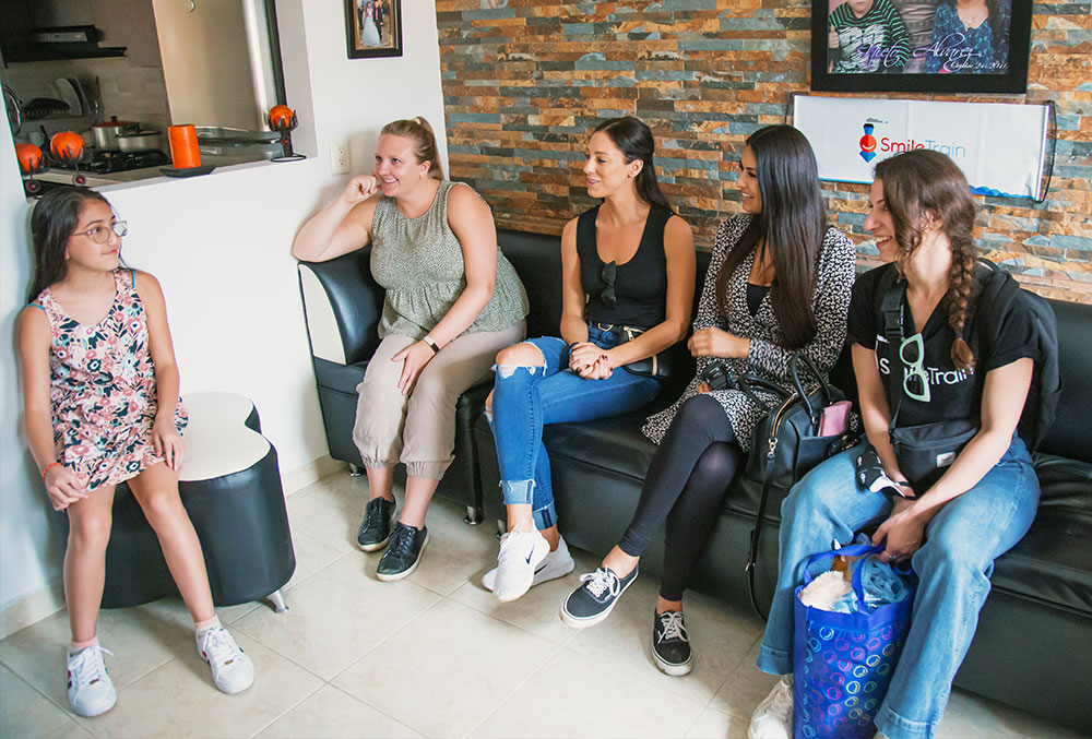 Lisa, Christine, and Brenda listen as Valery tells her story