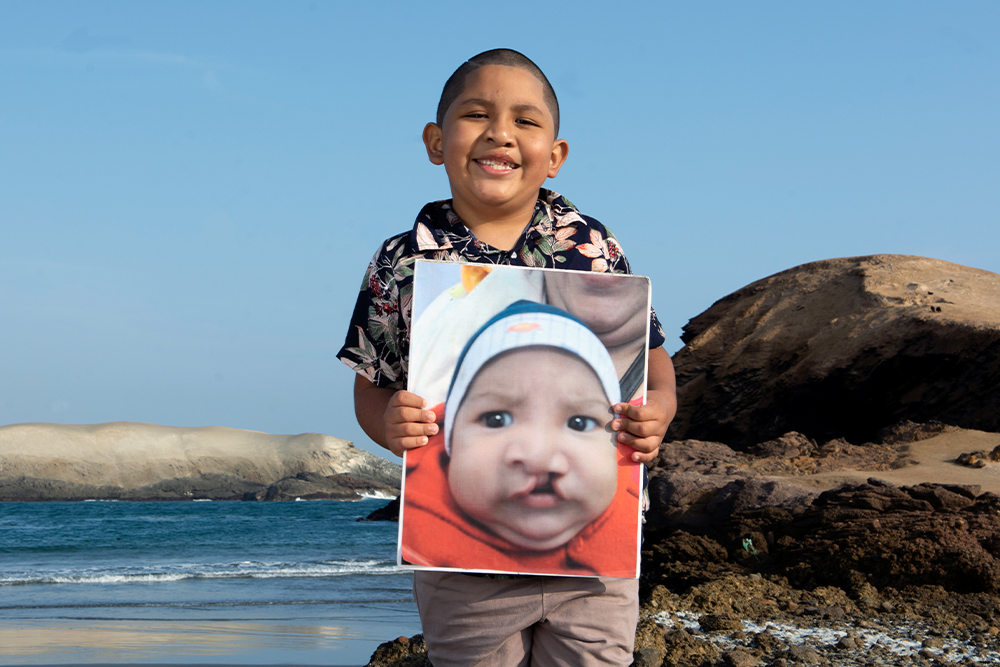 Ramses now holding a baby photo of him 