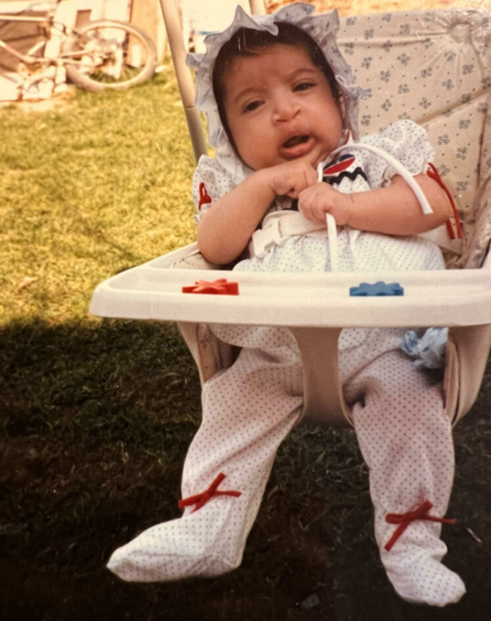 Nathalie on a baby swing