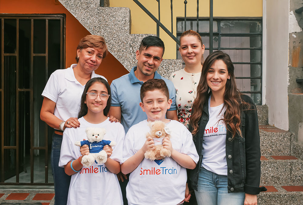 Valery's family with Clinicas Noel staff