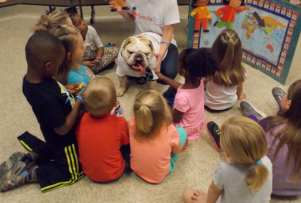 Stanley visiting a school