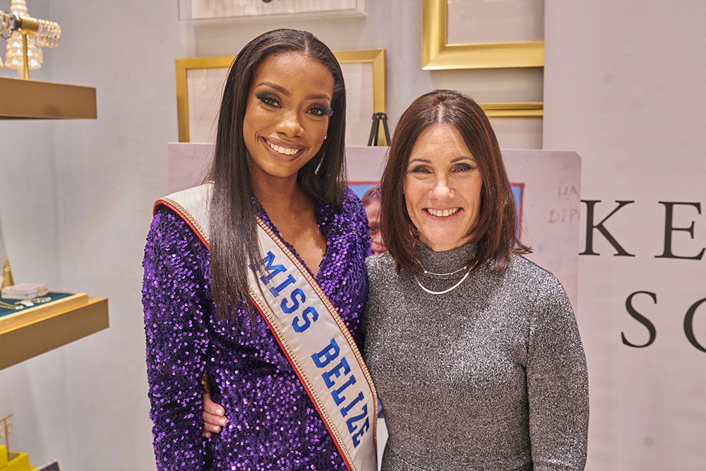 Miss Universe Belize Ashley Lightburn and Smile Train President and CEO Susie Schaeffer share a smile