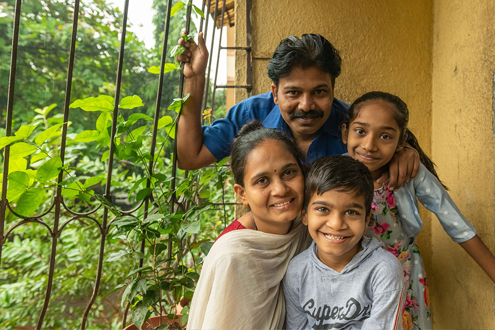 Samrat smiling with his family