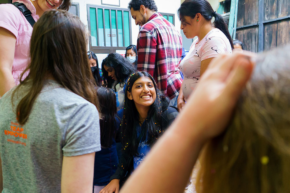 Sarah surrounded by new friends at Tess Unlimited