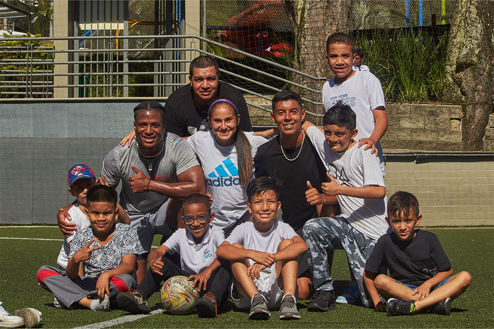 Carolina Arbeláez and Kenyan Drake pose with Smile Train patients