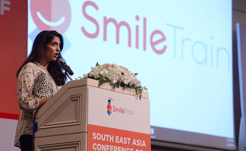 Priya Desai speaking on behalf of Smile Train at a conference