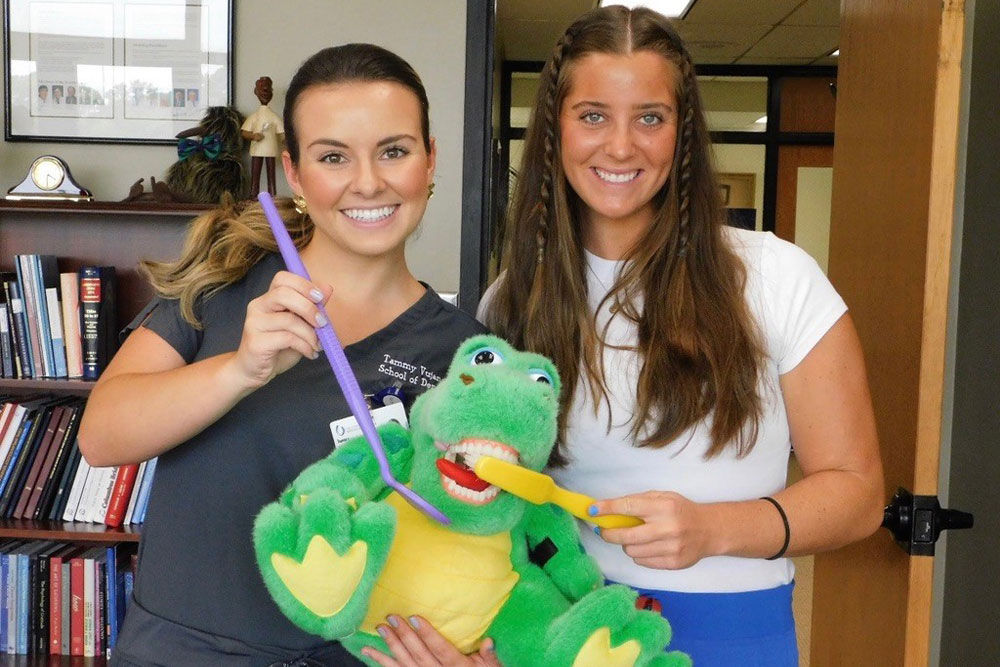 Tammy with her dental school mentor, Morgan Baker