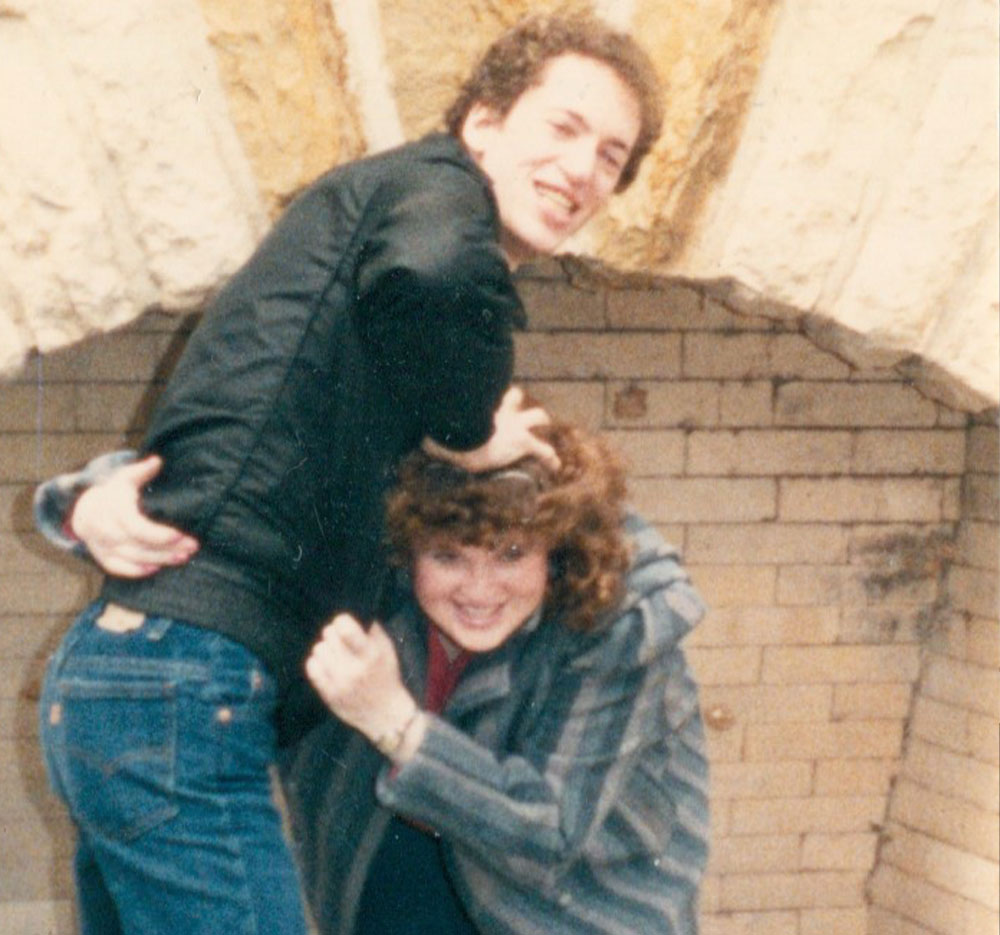 Linda and John playing around in their twenties