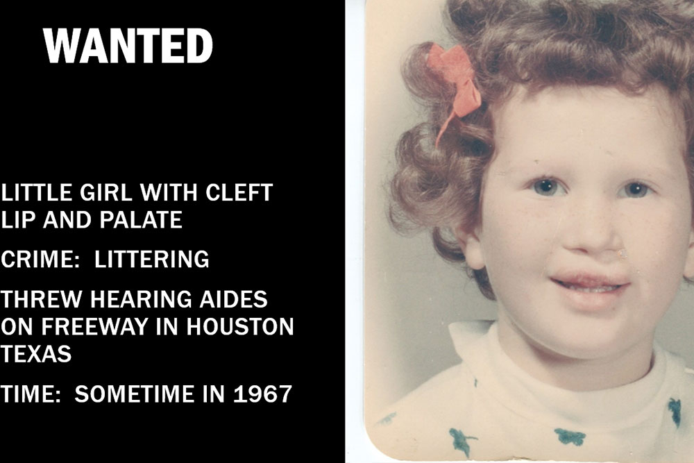 A wanted poster with a picture of Linda as a child proclaiming her guilty of littering her hearing aids on a Houston freeway