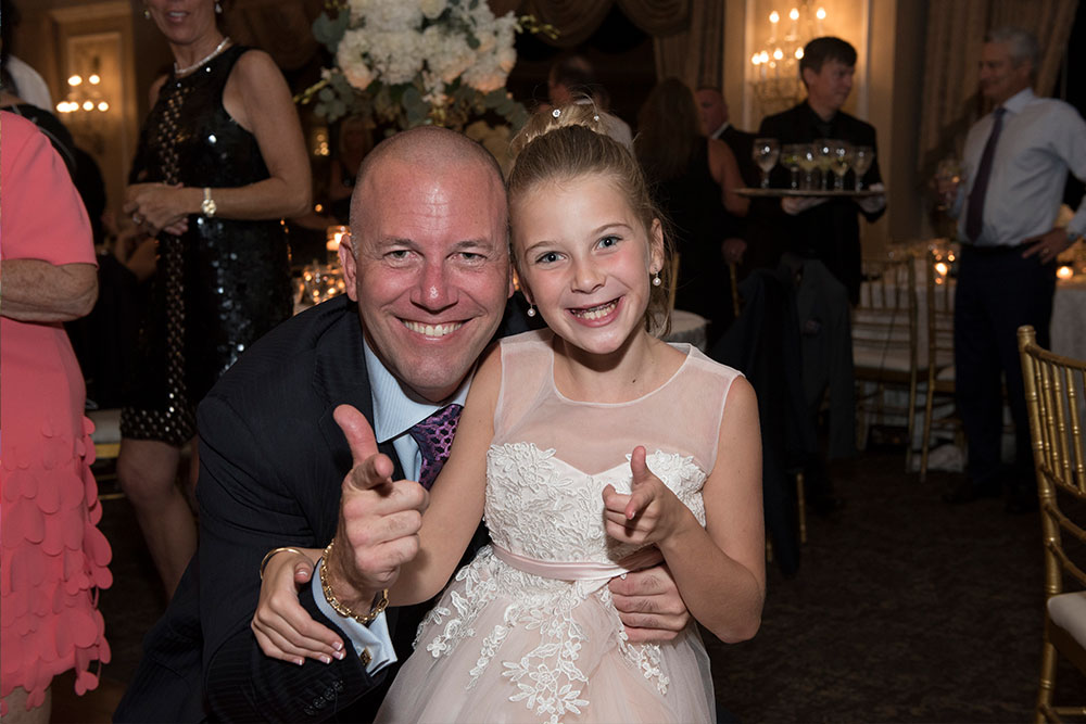 Ella and her dad, Jimmy, sharing a smile at her 10-year birthday gala