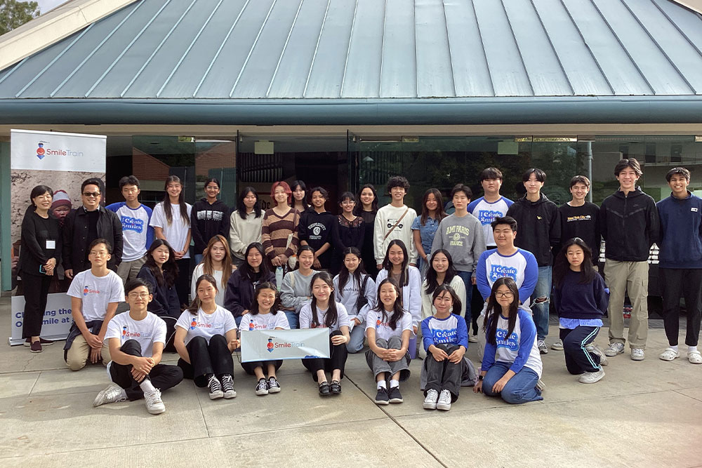 Young Sook with the many volunteers who made the 2023 concert possible
