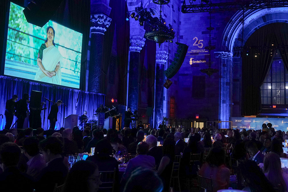 Sister Shoba’s image on a large screen at Smile Train’s 25th Anniversary Gala in New York May 8, 2024