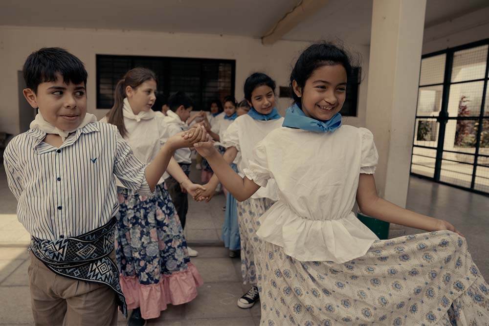 Victoria after cleft surgery dancing in traditional Argentinian garb