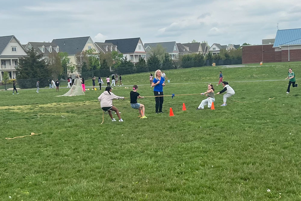 Mercer Middle School students playing tug-of-war at Mercer Smiles 2025