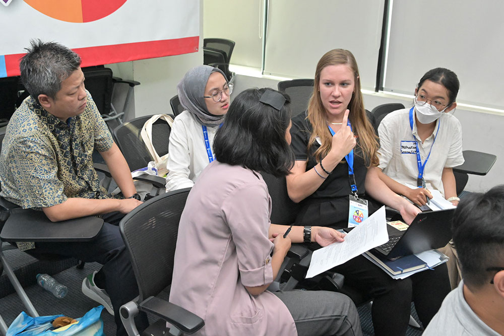 Sara leading a training of Smile Train speech partners in Indonesia