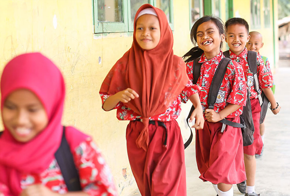 Aira lining up with her friends at school