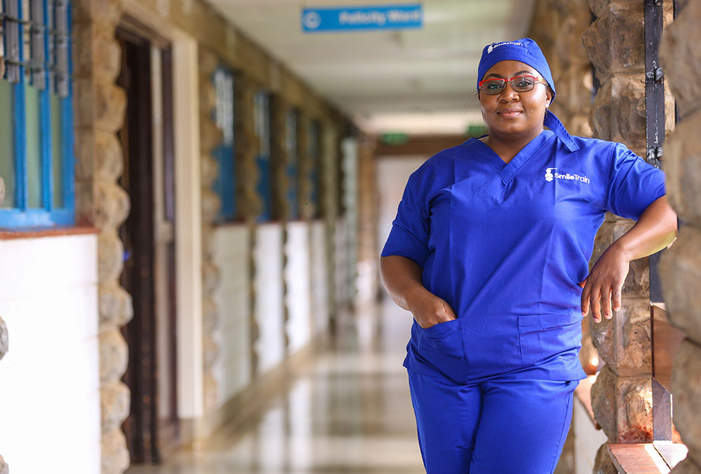 Cleft surgeon Dr. Malungo standing outside her hospital in Lusaka, Zambia.