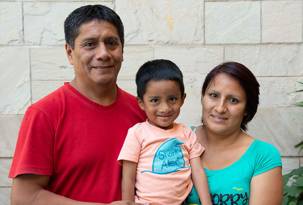 Anghelo with his father, Jorje, and mother, Michela, after free cleft treatment in Peru.