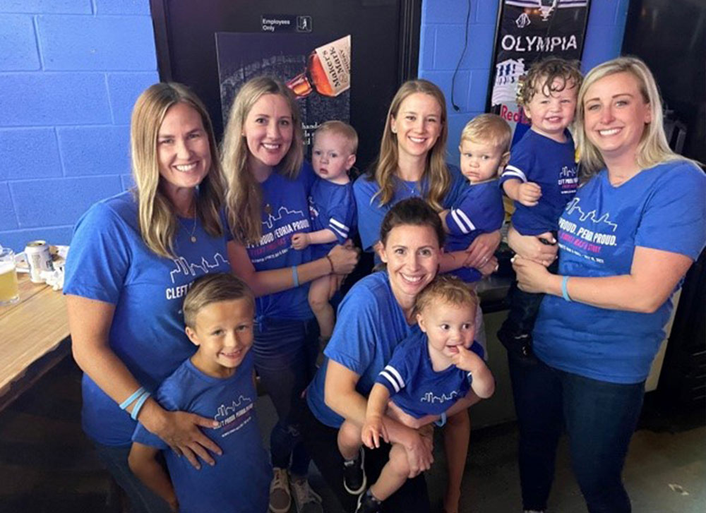 The moms and their boys together at their Smile Train fundraiser in Peoria.