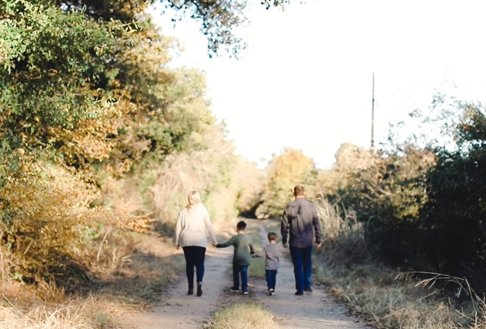 The Pietersma family walking away into the sunset