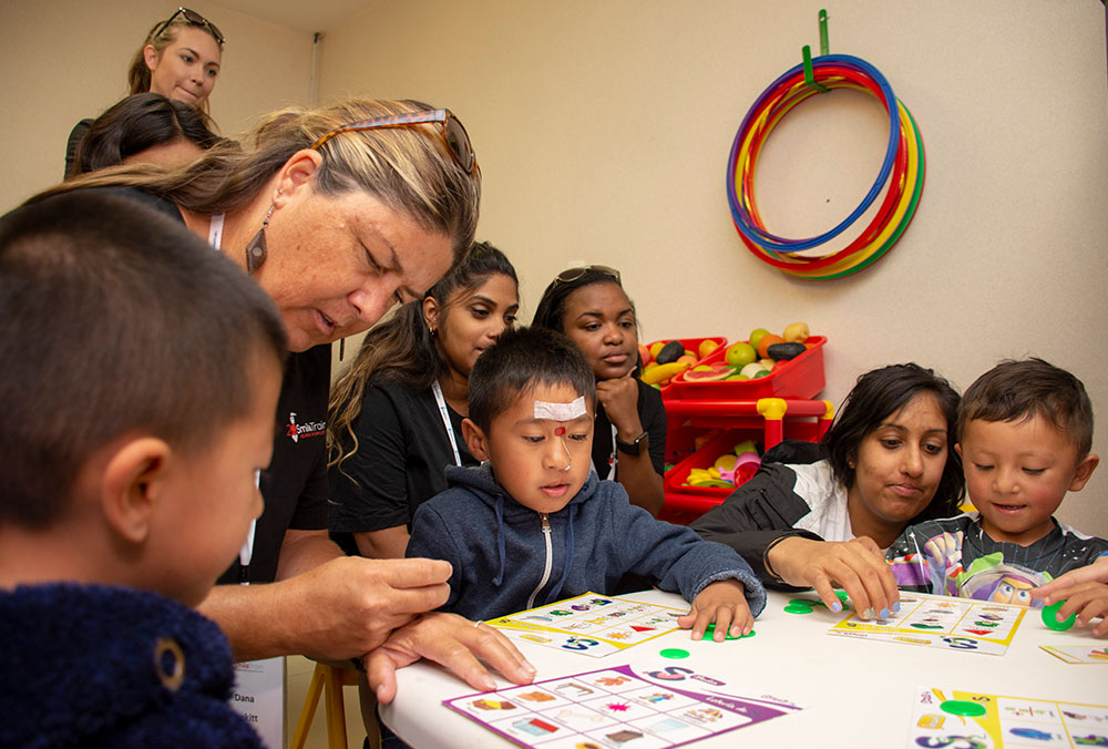 Dana interacting with Smile Train patients in Mexico