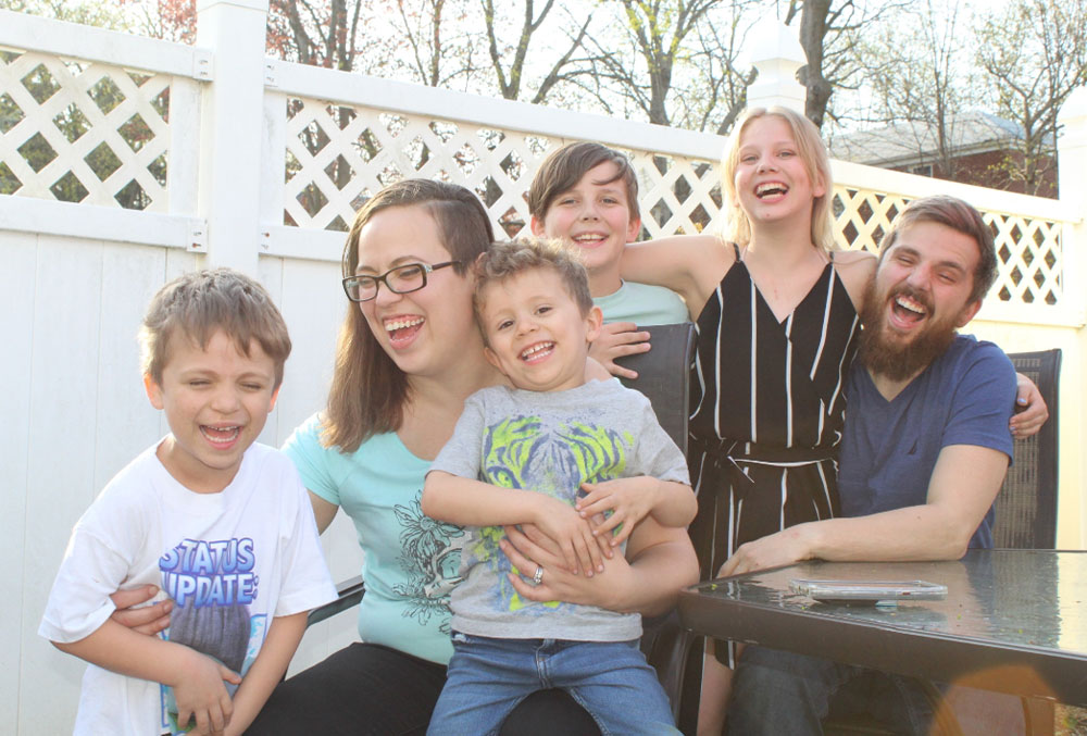 Jasmine with Daniel, her husband, and other children.