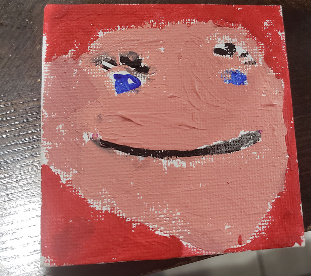 Daniel's self-portrait, painted as part of a Cleft Con activity.